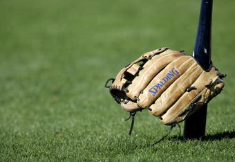 FORT MYERS, FL - FERUARY 20:  A bat and glove are seen prior to morning workouts on February 20, 2005 at the Boston Red Sox Minor League Spring Training facility in Fort Myers, Florida.  (Photo by Eliot J. Schechter/Getty Images)