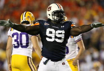 AUBURN, AL - SEPTEMBER 20: Defensive lineman Tez Doolittle #99 of the Auburn Tigers celebrates after place kicker Colt David #6 of the LSU Tigers missed a field goal at Jordan-Hare Stadium on September 20, 2008 in Auburn, Alabama. (Photo by Doug Benc/Getty Images)