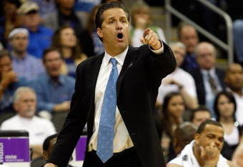 KANSAS CITY, MO - MARCH 21:  Head Coach John Calipari of the Memphis Tigers points a finger from the sideline during their second round game against the Maryland Terrapins in the NCAA Division I Men's Basketball Tournament at the Sprint Center on March 21, 2009 in Kansas City, Missouri. The Tigers defeated the Terrapins 89-70.  (Photo by Jamie Squire/Getty Images)