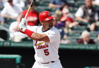 JUPITER, FL - FEBRUARY 25:  Albert Pujols #5 of the St. Louis Cardinals bats against the Florida Marlins during a spring training game at Roger Dean Stadium on February 25, 2009 in Jupiter, Florida. The Marlins and the Mets played to a 5-5 tie in 10 innings.  (Photo by Doug Benc/Getty Images)