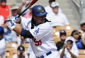 GLENDALE, AZ - MARCH 13:   Manny Ramirez #99 of the Los Angeles Dodgers at bat during a Spring Training game against the Texas Rangers on March 13, 2009 at Camelback Ranch in Glendale, Arizona.  (Photo by Lisa Blumenfeld/Getty Images)