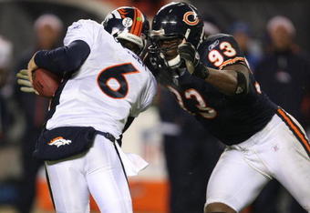 CHICAGO - NOVEMBER 25: Adewale Ogunleye #93 of the Chicago Bears sacks Jay Cutler #6 of the Denver Broncos late in regulation on November 25, 2007 at Soldier Field in Chicago, Illinois. (Photo by Jonathan Daniel/Getty Images)