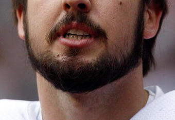 HOUSTON - DECEMBER 28:  Kyle Orton #18 of the Chicago Bears reacts looks up at the clock during the game against the Houston Texans during the second half at the Reliant Stadium December 28, 2008 in Houston, Texas.  The Bears lost 31-24 and failed to make the playoffs.  (Photo by Harry How/Getty Images)