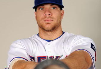 SURPRISE, AZ - FEBRUARY 24:  Chris Davis #19 of the Texas Rangers poses during photo day at Surprise Stadium on February 24, 2009 in Surprise, Arizona.  (Photo by Harry How/Getty Images)