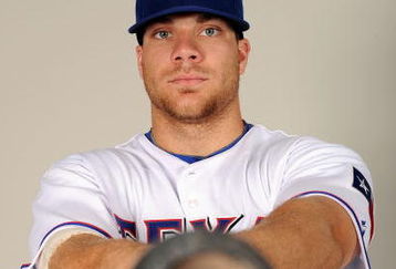SURPRISE, AZ - FEBRUARY 24:  Chris Davis #19 of the Texas Rangers poses during photo day at Surprise Stadium on February 24, 2009 in Surprise, Arizona.  (Photo by Harry How/Getty Images)