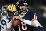 CHICAGO - DECEMBER 22: Kyle Orton #18 of the Chicago Bears looks for a receiver against the Green Bay Packers on December 22, 2008 at Soldier Field in Chicago, Illinois. The Bears defeated the Packers 20-17 in overtime. (Photo by Jonathan Daniel/Getty Images)