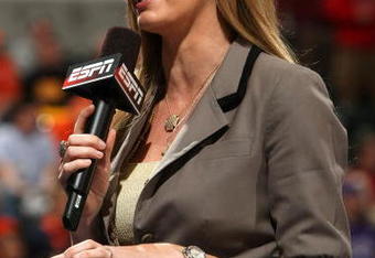 INDIANAPOLIS - MARCH 12:  ESPN's Erin Andrews conducts an on camera report during a stop in play between the Michigan Wolveriens and the Iowa Hawkeyes during the first round of the Big Ten Men's Basketball Tournament at Conseco Fieldhouse on March 12, 2009 in Indianapolis, Indiana.  (Photo by Jonathan Daniel/Getty Images)