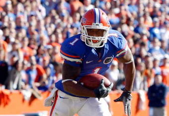 GAINESVILLE, FL - NOVEMBER 22:  Percy Harvin #1 of the Florida Gators runs for a touchdown during the game against the Citadel Bulldogs at Ben Hill Griffin Stadium on November 22, 2008 in Gainesville, Florida.  (Photo by Sam Greenwood/Getty Images)
