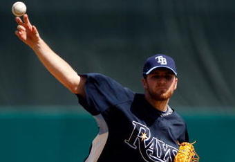 FORT MYERS, FL - MARCH 08:  Pitcher Wade Davis #58 of the Tampa Bay Rays pitches against the Boston Red Sox during a Grapefruit League Spring Training Game at City of Palms Park on March 8, 2009 in Fort Myers, Florida.  (Photo by J. Meric/Getty Images)