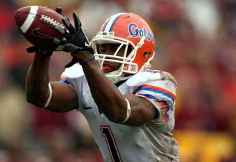 TALLAHASSEE, FL - NOVEMBER 29:  Receiver Percy Harvin #1 of the Florida Gators takes a direct snap and runs for a touchdown  against the Florida State Seminoles at Bobby Bowden Field at Doak Campbell Stadium on November 29, 2008 in Tallahassee, Florida.  The Gators defeated the Seminoles 45-15.  (Photo by Marc Serota/Getty Images)