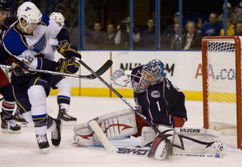 ST. LOUIS, MO. - MARCH 28: Steve Mason #1 of the Columbus Bluejackets makes a save against David Backes #42 of the St. Louis Blues at the Scottrade Center on March 28, 2009 in St. Louis, Missouri.  (Dilip Vishwanat/Getty Images)