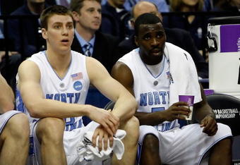 MEMPHIS, TN - MARCH 29:  Tyler Hansbrough #50 and Ty Lawson #5 of the North Carolina Tar Heels sit on the bench in the first half while taking on the Oklahoma Sooners during the NCAA Men's Basketball Tournament South Regional Final at the FedExForum on March 29, 2009 in Memphis, Tennessee.  (Photo by Joe Murphy/Getty Images)