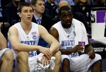 MEMPHIS, TN - MARCH 29:  Tyler Hansbrough #50 and Ty Lawson #5 of the North Carolina Tar Heels sit on the bench in the first half while taking on the Oklahoma Sooners during the NCAA Men's Basketball Tournament South Regional Final at the FedExForum on March 29, 2009 in Memphis, Tennessee.  (Photo by Joe Murphy/Getty Images)