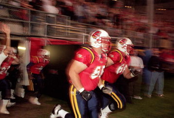 10 Feb 2001:  Dan Goodspeed #68 and Dan Collins #66 of the Orlando Rage run out to the field before the game against the San Francisco Demons at the Citrus Bowl in Orlando, Florida. The Rage defeated the Demons 26-14.Mandatory Credit: Andy Lyons  /Allsport