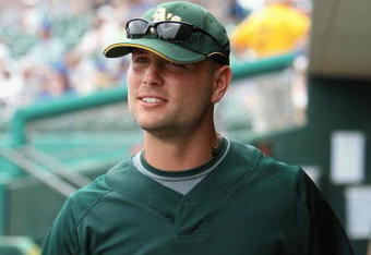 MESA, AZ - MARCH 03:  Matt Holliday #5 of the Oakland Athletics warms up before the spring training game agaisnt the Chicago Cubs at HoHoKam Park on March 3, 2009 in Mesa, Arizona.  The Cubs defeated the A's 6-4.  (Photo by Christian Petersen/Getty Images)
