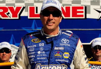 FORT WORTH, TX - APRIL 03:  David Reutimann, driver of the #00 Aaron's Dream Machine Toyota, poses in victory lane after qualifying for the pole position for the NASCAR Sprint Cup Series Samsung 500 at Texas Motor Speedway on April 3, 2009 in Fort Worth, Texas.  (Photo by Rusty Jarrett/Getty Images for NASCAR)