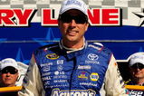 FORT WORTH, TX - APRIL 03:  David Reutimann, driver of the #00 Aaron's Dream Machine Toyota, poses in victory lane after qualifying for the pole position for the NASCAR Sprint Cup Series Samsung 500 at Texas Motor Speedway on April 3, 2009 in Fort Worth, Texas.  (Photo by Rusty Jarrett/Getty Images for NASCAR)