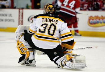 RALEIGH, NC - FEBRUARY 17:  Tim Thomas #30 of the Boston Bruins looks on during the game against the Carolina Hurricanes on February 17, 2009 at RBC Center in Raleigh, North Carolina.  (Photo by Kevin C. Cox/Getty Images)