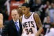 EAST RUTHERFORD, NJ - NOVEMBER 07: Devin Harris #34 is helped from the court by Lawrence Frank, head coach of the New Jersey Nets during a game against of the Detroit Pistons November 7, 2008 at the Izod Arena in East Rutherford, New Jersey. (Photo by Jeff Zelevansky/Getty Images)