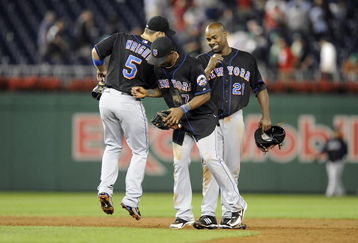 WASHINGTON - SEPTEMBER 17: Carlos Delgado #21, David Wright #5 and Jose Reyes #7 of the New York Mets celebrate after a 9-7 victory against the Washington Nationals September 17, 2008 at Nationals Park in Washington, DC.  (Photo by Greg Fiume/Getty Images)