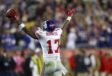 GLENDALE, AZ - FEBRUARY 03:  Wide receiver Plaxico Burress #17 of the New York Giants celebrates after catching a 13-yard touchdown pass in the fourth quarter against the New England Patriots during Super Bowl XLII on February 3, 2008 at the University of Phoenix Stadium in Glendale, Arizona.  The Giants defeated the Patriots 17-14. (Photo by Donald Miralle/Getty Images)
