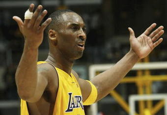 LOS ANGELES - JANUARY 27:   Kobe Bryant #8 of the Los Angeles Lakers complains about a no call in the game with the Golden State Warriors on January 27, 2006 at Staples Center in Los Angeles, California. The Lakers won 106-105 in overtime. NOTE TO USER: User expressly acknowledges and agrees that, by downloading and or using this photograph, User is consenting to the terms and conditions of the Getty Images License Agreement.   (Photo by Stephen Dunn /Getty Images)