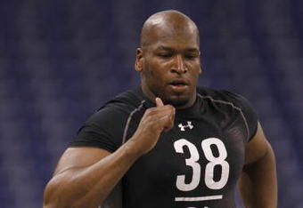 INDIANAPOLIS, IN - FEBRUARY 21:  Offensive lineman Eugene Monroe of Virginia runs the 40 yard dash during the NFL Scouting Combine presented by Under Armour at Lucas Oil Stadium on February 21, 2009 in Indianapolis, Indiana. (Photo by Scott Boehm/Getty Images)