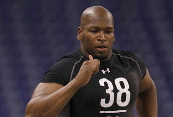 INDIANAPOLIS, IN - FEBRUARY 21:  Offensive lineman Eugene Monroe of Virginia runs the 40 yard dash during the NFL Scouting Combine presented by Under Armour at Lucas Oil Stadium on February 21, 2009 in Indianapolis, Indiana. (Photo by Scott Boehm/Getty Images)