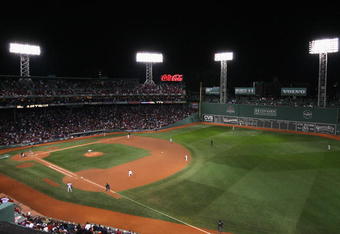 BOSTON - OCTOBER 16:  The Boston Red Sox and the Tampa Bay Rays compete in game five of the American League Championship Series during the 2008 MLB playoffs at Fenway Park on October 16, 2008 in Boston, Massachusetts. The Red Sox defeated the Rays 8-7 to set the series at 3-2 Rays. (Photo by Christian Petersen/Getty Images)