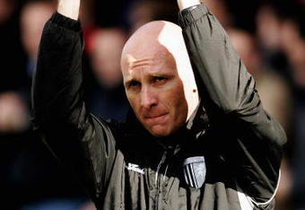 LONDON, ENGLAND - MARCH 28:  Gillingham manager Mark Stimson applaude the fans prior to the Coca-Cola League Two match between Brentford and Gillingham at Grifffin Park on March 28, 2009 in London, England.  (Photo by Dean Mouhtaropoulos/Getty Images)