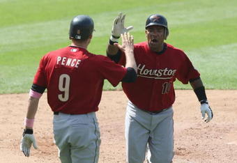 LOS ANGELES, CA - MAY 11:  (L-R)  Hunter Pence #9 congratulates teammate Miguel Tejada #10 of the Houston Astros after scoring in the 8th inning against the Los Angeles Dodgers at Dodger Stadium on May 11, 2008 in Los Angeles, California.  The Astros defeated the Dodgers 8-5.  (Photo by Lisa Blumenfeld/Getty Images)