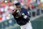 PHILADELPHIA - OCTOBER 01:  Rickie Weeks #23 of the Milwaukee Brewers throws to first in Game 1 of the NLDS Playoff against the Philadelphia Phillies at Citizens Bank Ballpark on October 1, 2008 in Philadelphia, Pennsylvania  (Photo by Jeff Zelevansky/Getty Images)
