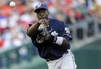 PHILADELPHIA - OCTOBER 01:  Rickie Weeks #23 of the Milwaukee Brewers throws to first in Game 1 of the NLDS Playoff against the Philadelphia Phillies at Citizens Bank Ballpark on October 1, 2008 in Philadelphia, Pennsylvania  (Photo by Jeff Zelevansky/Getty Images)