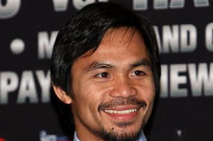 HOLLYWOOD - MARCH 30:  Professional boxer Manny Pacquiao attends 'The Battle of East and West', a promotion for the May 2, 2009 World Junior Welterweight Championship boxing match held at the Roosevelt Hotel on March 30, 2009 in Hollywood, California.  (Photo by Alberto E. Rodriguez/Getty Images)