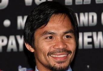 HOLLYWOOD - MARCH 30:  Professional boxer Manny Pacquiao attends 'The Battle of East and West', a promotion for the May 2, 2009 World Junior Welterweight Championship boxing match held at the Roosevelt Hotel on March 30, 2009 in Hollywood, California.  (Photo by Alberto E. Rodriguez/Getty Images)