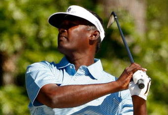 HUMBLE, TX - APRIL 03:  Vijay Singh makes a shot from the fairway on the second hole during the first round of the Shell Houston Open at Redstone Golf Club April 3, 2009 in Humble, Texas.  (Photo by Chris Graythen/Getty Images)