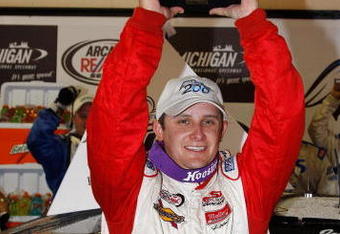 BROOKLYN, MI - JUNE 14:  Justin Lofton driver of the # 20 Lofton Cattle Dodge holds the trophy after winning the ARCA RE/MAX Series Racing for Wildlife 200 at the Michigan International Speedway on June 14, 2008 in Brooklyn, Michigan.  (Photo by John Harrelson/Getty Images for NASCAR)