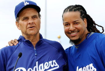 GLENDALE, AZ - MARCH 05:  Manny Ramirez #99 (L) of the Los Angeles Dodgers and manager Joe Torre #6 speak during a news conference on March 5, 2009, at Camelback Ranch in Glendale, Arizona. Ramirez signed a $45 million two-year contract on Wednesday.  (Photo by Kevork Djansezian/Getty Images)