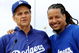 GLENDALE, AZ - MARCH 05: Manny Ramirez #99 (L) of the Los Angeles Dodgers and manager Joe Torre #6 speak during a news conference on March 5, 2009, at Camelback Ranch in Glendale, Arizona. Ramirez signed a $45 million two-year contract on Wednesday. (Photo by Kevork Djansezian/Getty Images)