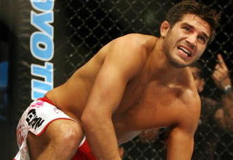 CHICAGO- OCTOBER 25:  Patrick Cote cannot continue the fight in the second round, after he injured his knee in the Middleweight Title Bout at UFC's Ultimate Fight Night at Allstate Arena on October 25, 2008 in Chicago, Illinois. (Photo by Tasos Katopodis/Getty Images)