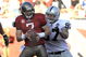 TAMPA, FL - DECEMBER 28: Defensive end Greyson Gunheim #97 of the Oakland Raiders sacks quarterback Jeff Garcia #7 of the Tampa Bay Buccaneers at Raymond James Stadium on December 28, 2008 in Tampa, Florida.  (Photo by Al Messerschmidt/Getty Images)