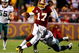 LANDOVER, MD - DECEMBER 21:  Quarterback Jason Campbell #17 of the Washington Redskins rushes upfield away from Victor Abiamiri #95 of the Philadelphia Eagles during the game on December 21, 2008 at FedEx Field in Landover, Maryland.  (Photo by Kevin C. Cox/Getty Images)