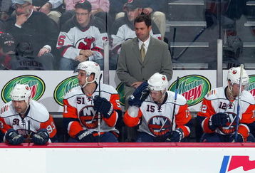 NEWARK, NJ - FEBRUARY 11:  Head coach Scott Gordon of the New York Islanders looks on against the New Jersey Devils at the Prudential Center on February 11, 2009 in Newark, New Jersey.The Devils defeated the Isles 4-2.  (Photo by Jim McIsaac/Getty Images)