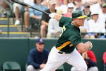TEMPE, AZ - MARCH 08:  Matt Holliday #5 of the Oakland Athletics bats against the Cleveland Indians during the spring training game at Phoenix Municipal Stadium on March 8, 2009 in Tempe, Arizona. The A's defeated the Indians 8-5.  (Photo by Christian Petersen/Getty Images)