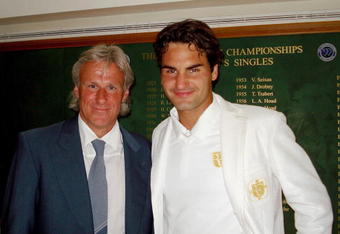 LONDON - JULY 8:  Men's singles champion Roger Federer (R) of Switzerland poses with former champion Bjorn Borg in the members area at the All England Lawn Tennis and Croquet Club following Federer's victory over Rafael Nadal of Spain in the Wimbledon Lawn Tennis Championships on July 8, 2007 in London, England. (Photo by ATP via Getty Images)