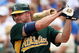 MESA, AZ - MARCH 03:  Jason Giambi #16 of the Oakland Athletics warms up on deck during the spring training game against the Chicago Cubs at HoHoKam Park on March 3, 2009 in Mesa, Arizona.  The Cubs defeated the A's 6-4.  (Photo by Christian Petersen/Getty Images)