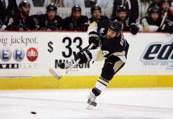 PITTSBURGH - MAY 31: Rob Scuderi #4 of the Pittsburgh Penguins skates against the Detroit Red Wings during game four of the 2008 NHL Stanley Cup Finals at Mellon Arena on May 31, 2008 in Pittsburgh. Pennsylvania. The Red Wings defeated the Penguins 2-1 to set the series at 3-1 Red Wings. (Photo by Jim McIsaac/Getty Images) 