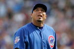 CHICAGO, IL - SEPTEMBER 19: Pitcher Carlos Zambrano #38 of the Chicago Cubs looks to the sky as he walks off the field after being taken out of the game in the 2nd inning against the St. Louis Cardinals at Wrigley Field on September 19, 2008 in Chicago, Illinois. (Photo by Scott Boehm/Getty Images)