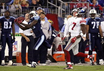 NASHVILLE, TN - NOVEMBER 26:  Pacman Jones #32 of the Tennessee Titans catches a third quarter interception intended for Plaxico Burress #17 of the New York Giants during their game on November 26, 2006 at LP Field in Nashville, Tennessee.  (Photo by Jim McIsaac/Getty Images)
