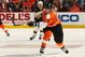 PHILADELPHIA - MARCH 29: Darrell Powe #36 of the Philadelphia Flyers skates against the Boston Bruins at the Wachovia Center on March 29, 2009 in Philadelphia, Pennsylvania.  (Photo by Chris McGrath/Getty Images)